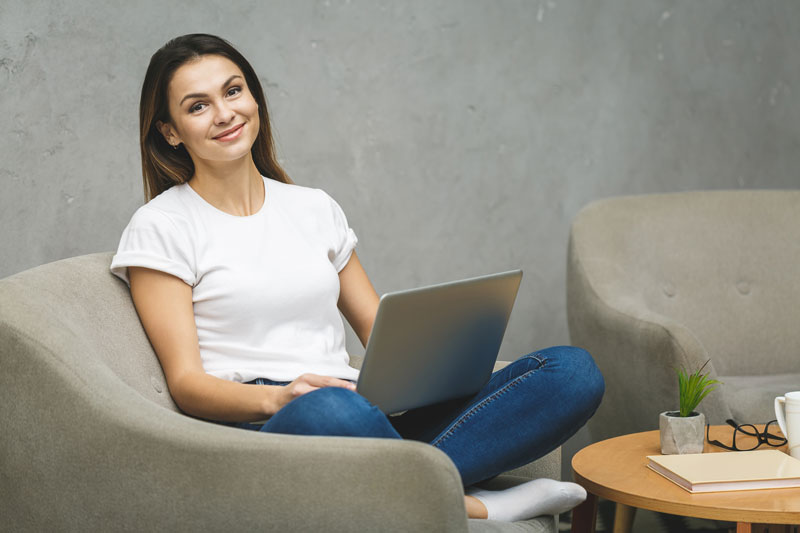 Woman attending virtual therapy session
